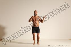 Underwear Gymnastic poses Man Black Muscular Bald Dancing Dynamic poses Academic